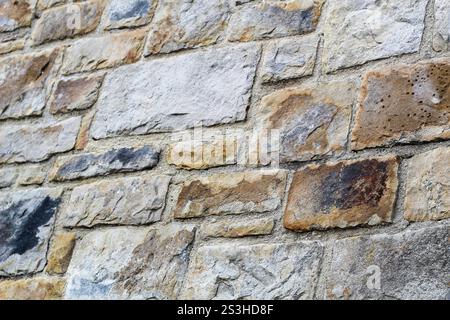 Brick stone wall texture angled close up Stock Photo