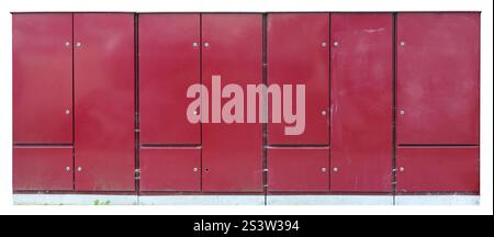 Old electrical cabinets with electrical equipment painted red. Isolated on white Stock Photo