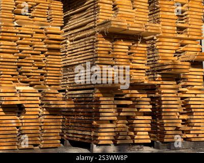 stack of wooden pallets,Lumber in the lumber industry, boards Stock Photo