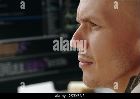 Serious Programmer Working With Metadata Stock Photo