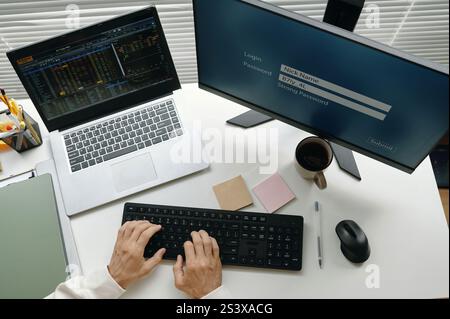 Programmer Working With Metadata On Computer Stock Photo