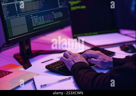 Programmer Typing Codes On Computer Stock Photo