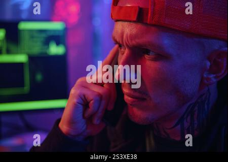 Developer Busy On The Phone Stock Photo