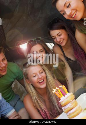 Group of Teenagers Celebrating Birthday Stock Photo