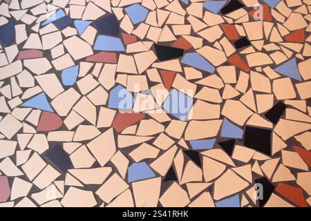 Venetian style floor with red, beige and blue tiles Stock Photo