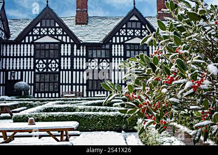 The Old Hall  built in 1656 a  black and white half timbered coaching inn in the Cheshire market town of Sandbach Cheshire after a fall of winter snow Stock Photo
