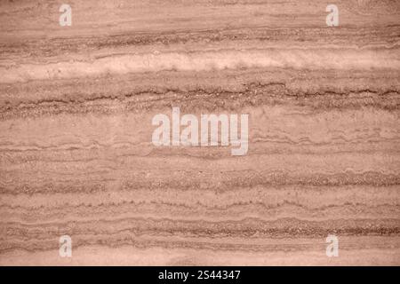 Natural travertine texture in mocha-mousse color, seamless and high-quality background. Stock Photo