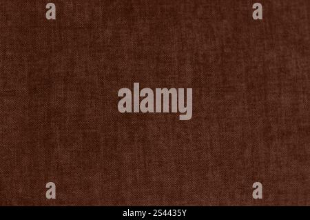 Detailed brown fabric texture with a natural woven appearance in mocha tone. Stock Photo