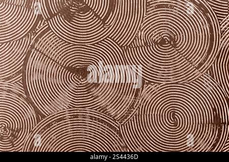 Close-up of decorative plaster in mocha-mousse, showcasing intricate patterns for accent walls. Stock Photo