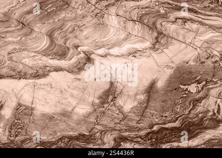 High-quality marble texture featuring mocha-mousse shades and intricate vein patterns. Stock Photo