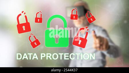 Man with vr headset touching a data protection concept on a touch screen with his finger Stock Photo