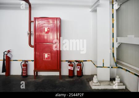 Fire hose cabinet, Fire equipment box, walkway area in modern building ...