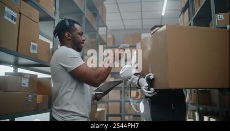 High-Tech Modern Warehouse: African American Inventory Specialist with ...