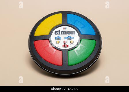 Pavia, Lombardy, Italy - November 2, 2024:“Simon” game by Milton Bradley Company, from 1978, at Ctrl+Alt Museum. Named also “Simon says”, it had a gre Stock Photo