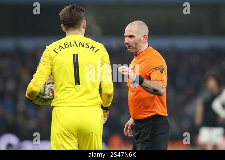 Referee Tim Robinson speaks to Łukasz Fabiański of West Ham United during the Emirates FA Cup 3rd Round match Aston Villa vs West Ham United at Villa Park, Birmingham, United Kingdom, 10th January 2025  (Photo by Gareth Evans/News Images) Stock Photo