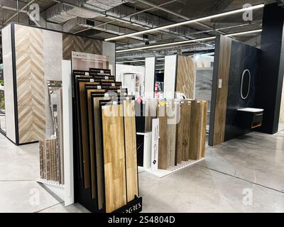 Kyiv, Ukraine - January 10, 2025: Stylish interior of a contemporary tile showroom featuring a variety of flooring and wall tiles for modern interior Stock Photo