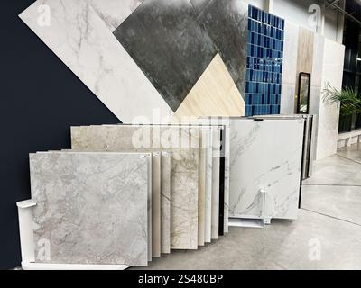 Kyiv, Ukraine - January 10, 2025: A presentation of various tiles arranged for selection, showcasing diverse designs, textures, and materials ideal fo Stock Photo