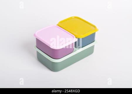 Three colorful Lunch Boxes isolated on white background. Plastic food containers Stock Photo