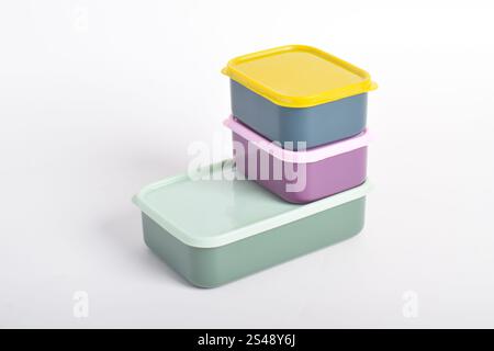 Three colorful Lunch Boxes isolated on white background. Plastic food containers Stock Photo