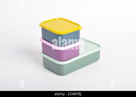 Three colorful Lunch Boxes isolated on white background. Plastic food containers Stock Photo