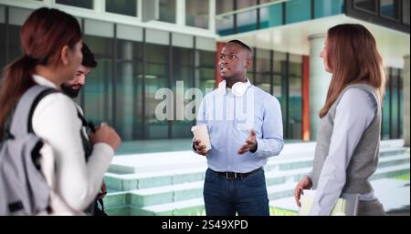 Happy University Friends Together Outside Campus Building Stock Photo
