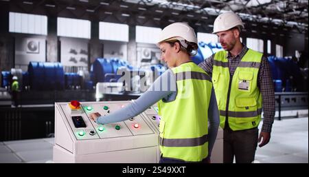 Engineers Working In Power Plant Electricity Generation Stock Photo