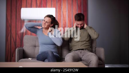 Sick Couple Having Cold And Sore Throat From Air Conditioner Stock Photo