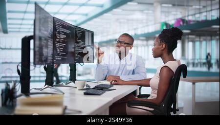 Web Developer Coding On Computer To Develop Code Stock Photo
