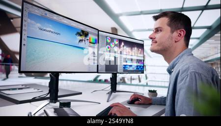 Graphic Web Designer Artist Using Computer To Design Stock Photo