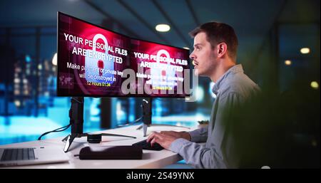 Ransomware Malware Cyber Attack On Business Computer Stock Photo