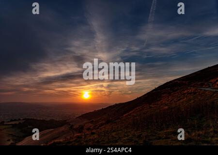 Sunset over the slopes of Moel Famau mountain, Clwydian Range, North Wales Stock Photo