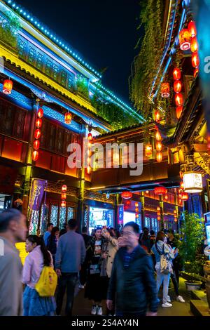 Chengdu, China, Sichuan, Crowd People, Chinese Tourists Visiting Old Town Historic Center, Street Scenes, Shop Fronts at Night Stock Photo