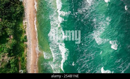 Aerial view of coastline of Baltic Sea with stormy waves. Recreation at the Baltic Sea. Vacation in Poland. Stock Photo