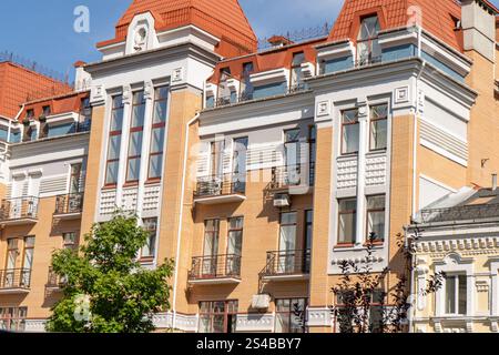 Orange color modern exterior of Houses Buildings. Bright windows architecture street Stock Photo