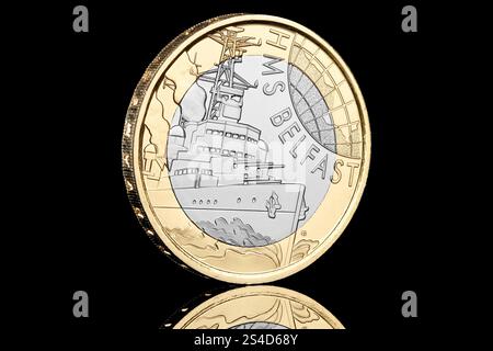 One of the first UK 2025 coins is the HMS Belfast design £2 coin featuring a King Charles portrait by Martin Jennings. Stock Photo