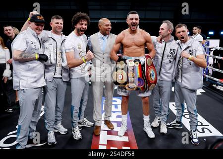 Callum Simpson (centre right) celebrates with his team after winning the British, Commonwealth & WBA Continental Super Middleweight Championship contest against Steed Woodall at the Canon Medical Arena, Sheffield. Picture date: Saturday January 11, 2025. Stock Photo