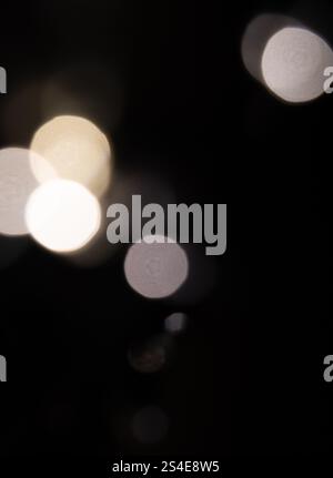 Abstract balls of light on black background Stock Photo