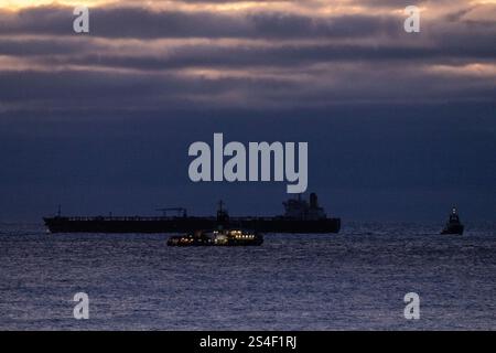 Sassnitz, Germany. 12th Jan, 2025. The unmaneuverable tanker "Eventin" is lying in the Sassnitz roadstead between Binz and Sassnitz. The tanker, which is loaded with around 99,000 tons of oil, is to remain there until a decision has been made on how to proceed. Credit: Stefan Sauer/dpa/Alamy Live News Stock Photo