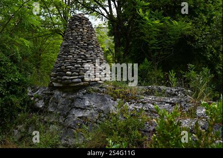 A natural stone pyramid or tower for balance and stability. Harmony relaxing stone stack object. Stock Photo