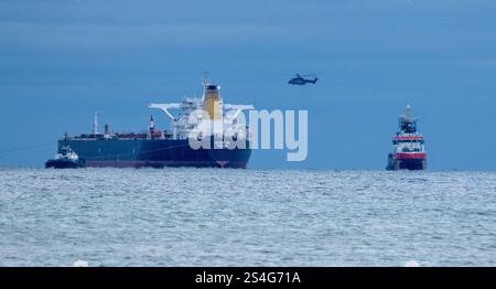 Sassnitz, Germany. 12th Jan, 2025. The unmaneuverable tanker "Eventin" is lying in the Sassnitz roadstead between Binz and Sassnitz. The tanker, which is loaded with around 99,000 tons of oil, is to remain there until a decision has been made on how to proceed. Credit: Stefan Sauer/dpa/Alamy Live News Stock Photo