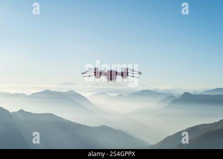 Drone flying over mountains Stock Photo