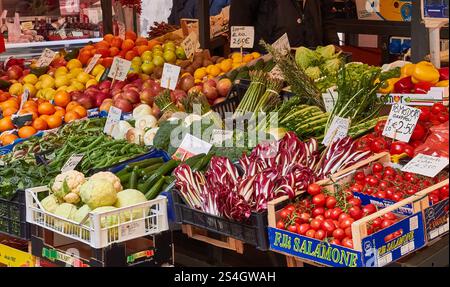 Vibrant Display of Fresh Fruits and Vegetables at a Local Market Stock Photo