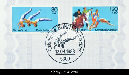 Cancelled postage stamps printed by Germany, that show Sports Aid 1983. Sport events circa 1983. Stock Photo