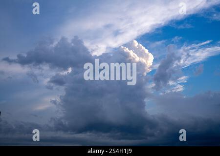 A cumulonimbus cloud forming over the Hudson River, Manhattan. Stock Photo