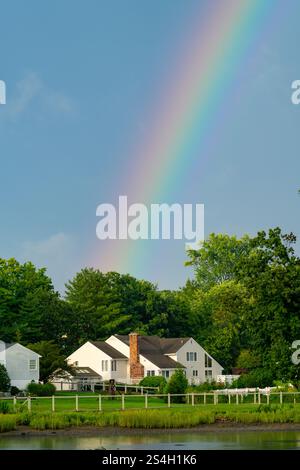 A rainbow over Holly Pond, Stamford, Connecticut Stock Photo