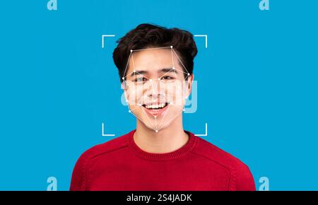 Facial recognition technology enhances identification with smiling subject Stock Photo