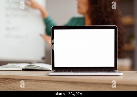 Teacher recording video, selective focus on blank gadget screen Stock Photo