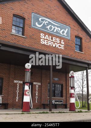 Imperial Gasoline vintage gas station with Ford sales and services sign on it. Ontario Canada. Stock Photo