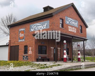 Imperial Gasoline vintage gas station with Ford sales and services sign on it. Ontario Canada. Stock Photo