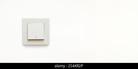 Cream colored wall mounted cream colored vavien or two-way light switch Stock Photo